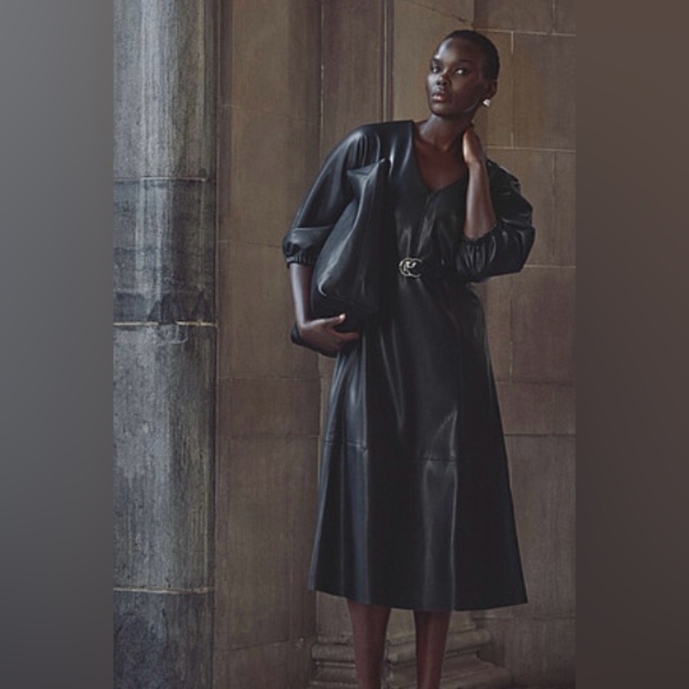 Black faux-leather midi (size small)